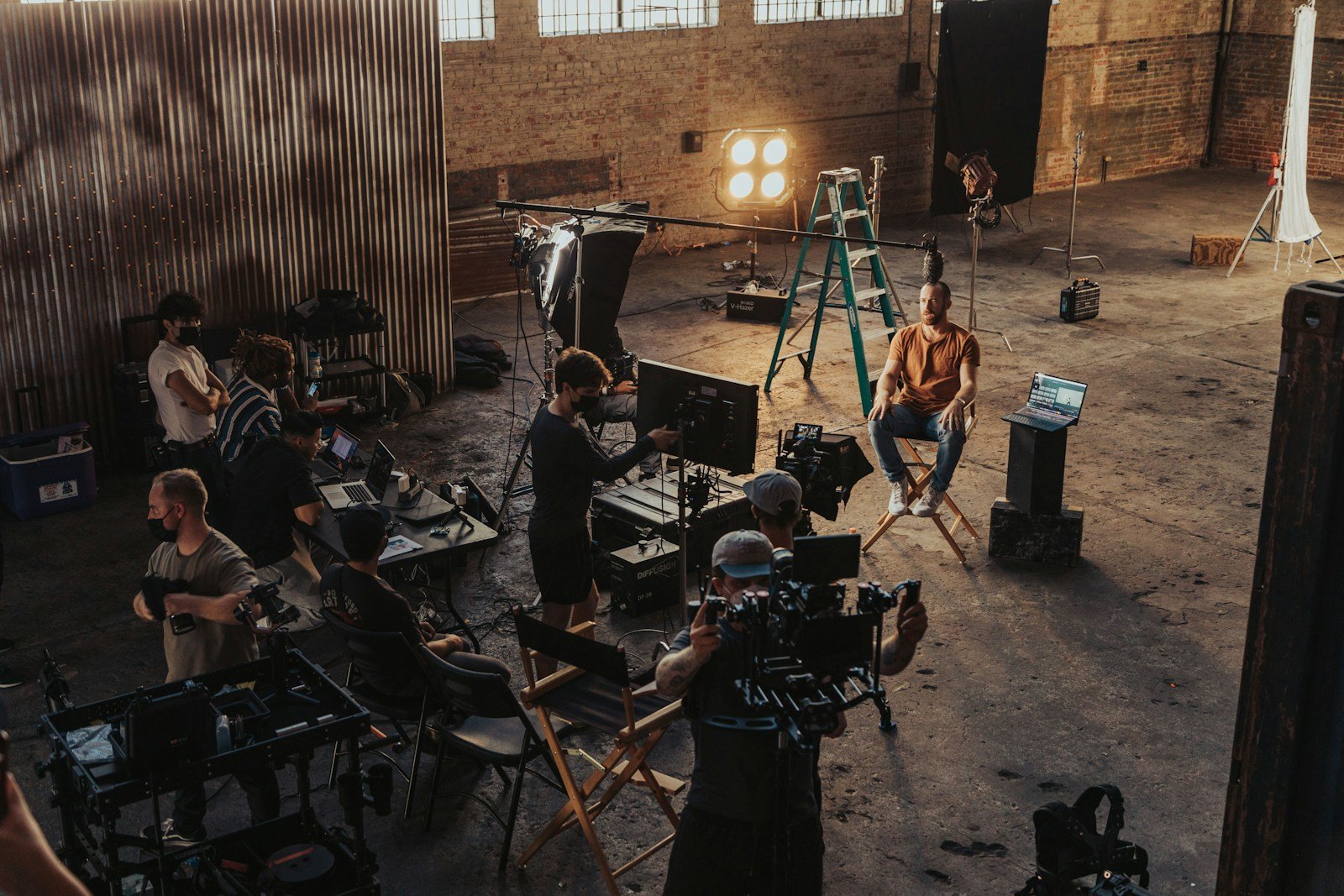A production crew preparing a cinema camera on set